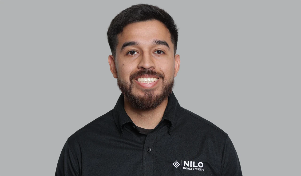 Bearded Nilo Group team member in a black uniform